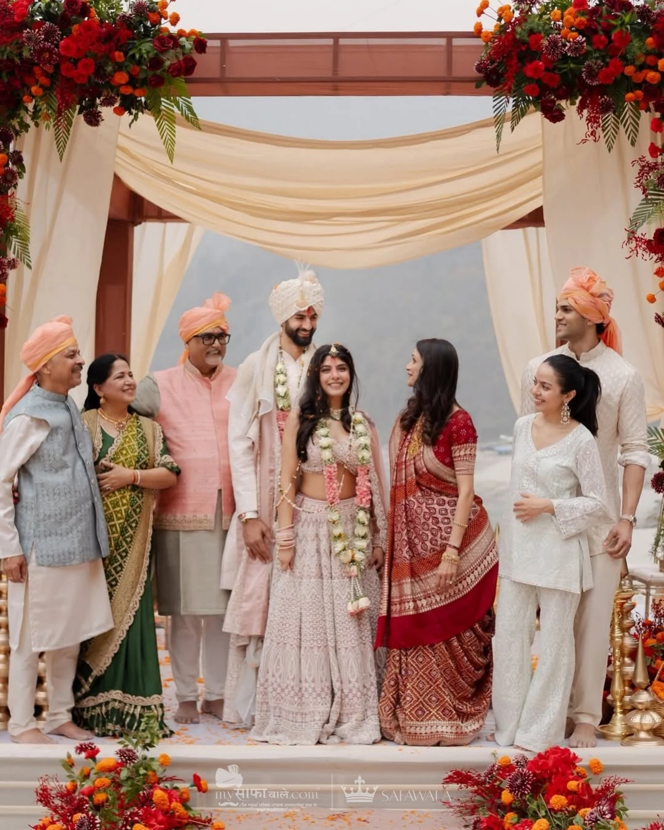 Royal red wedding safa and embroidered groom styling for Bamburi